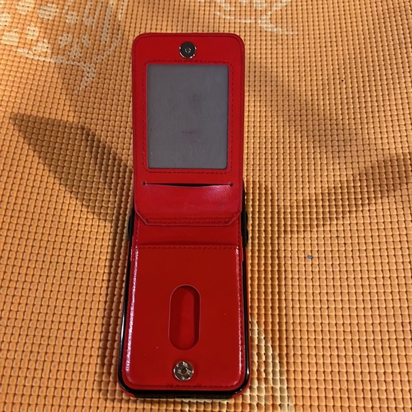 Red & beige IPhone XS case it has a flip up snap underneath to put CC/photo. - Picture 3 of 3